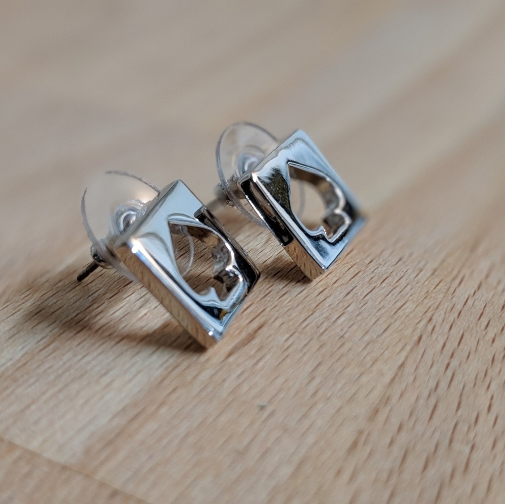 Kate Spade hole punch spade earrings
